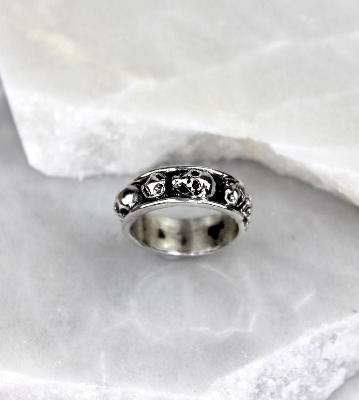 MEXICAN MADE SILVER BAND RING W/SKULLS [Sz:T]