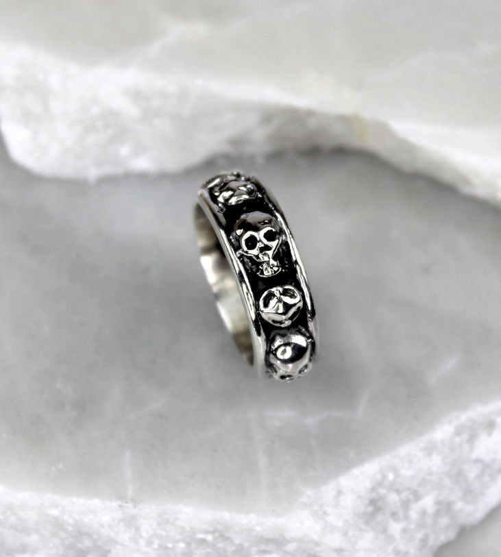 MEXICAN MADE SILVER BAND RING W/SKULLS [Sz:T]