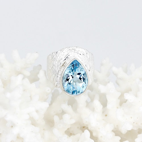 PEAR SHAPED BLUE TOPAZ SILVER RING