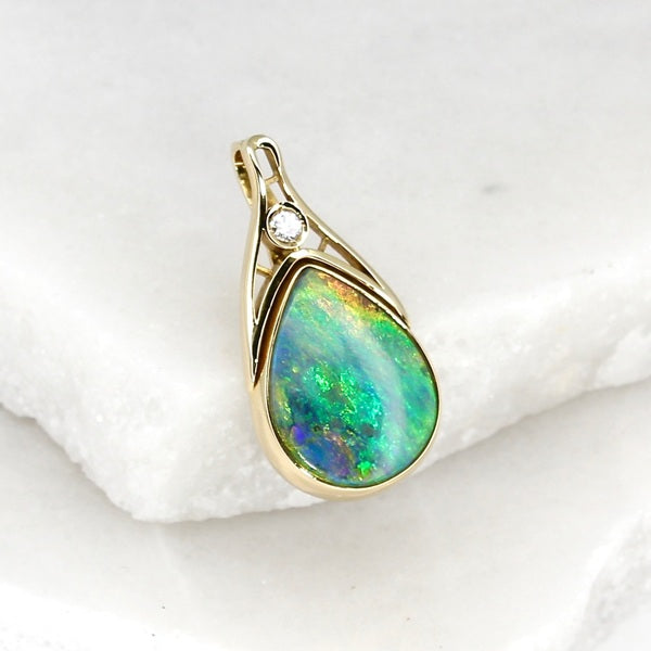 FIRE & EARTH 18CT GOLD BOULDER OPAL PENDANT WITH DIAMOND