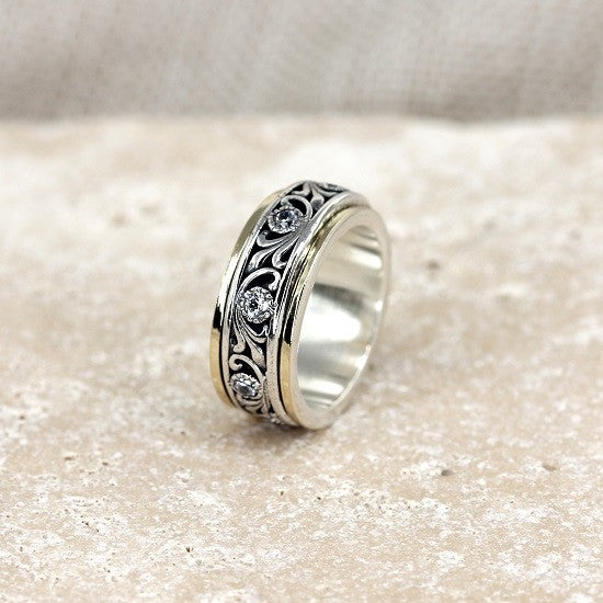 ISRAELI DESIGNED CZ, SILVER & 9CT Y/G SWIRL SPINNER RING | Master Jewellers